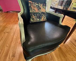 There are two of these beauties.  Hollywood Regency leather chairs purchased from Bloomingdale's in the 1950's.  PERFECT condition.  Just gorgeous!