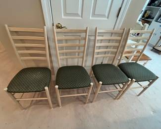 Four off-white Ladder back chairs.  