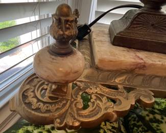 Gorgeous detail on the brass shelf.