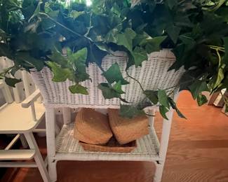 White wicker planter box. 