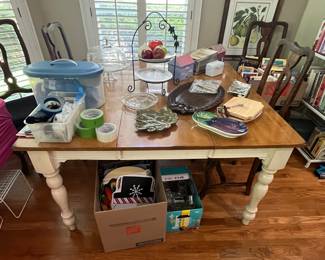 Kitchen Table -- Chairs that possibly would match this table are located in the basement of the home.  Sold Separately.