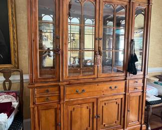Drexel Heritage Cabinet.  Sleek lines, not too ornate, not to plain.  Beautiful piece with leaded glass windows.  