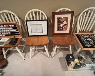 These four chairs located in the basement, possibly match the kitchen table upstairs.  Sold separately