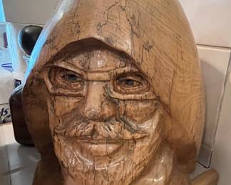 Solid wood bust.  This piece is unbelievably heavy.  **To us it sort of looks like a cross between Jerry Garcia of the Grateful Dead, and also the Gordon's Fisherman.**  Both could be wrong!  But what a conversation piece this 'wood' be!  