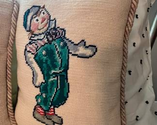 Needlepoint pillows of Raggedy Ann & Andy.  Just adorable.  