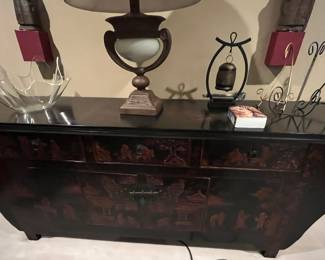 Look at the beautiful Asian pattern and lines of this piece.  Just a show stopping design piece for your home.  Will go with any decor.