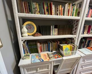 One section serves as a desk, the other section, shelving and drawers.  A number of different uses!  There is also a dresser, foot of bed storage bin, plant holder, and chair and footstool.  An entire set!  