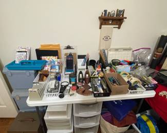 Lots of office supplies and containers 