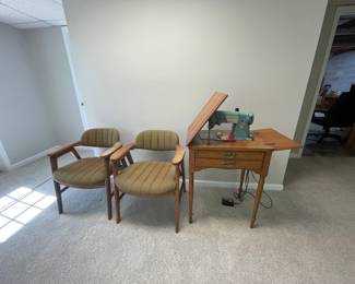 MCM cloth arm chairs and vintage Singer sewing machine
