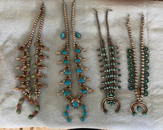 A large Selection of Southwestern Jewelry including these Squash Blossom Necklaces