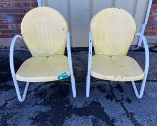 Pair of mid-century Shott style chairs.