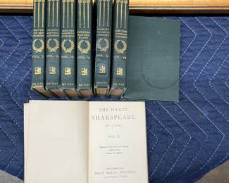 Eight volumes of Little Library Shakspeare.