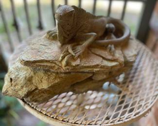 Concrete iguana rock statue