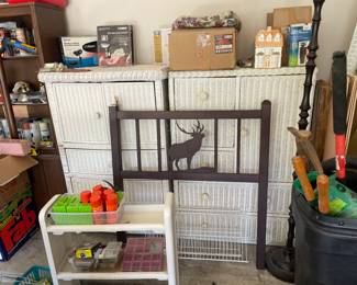 Twin size, metal headboard, wicker furniture, and assorted garage decor