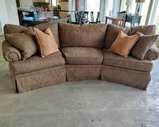 $200 Henredon curved sofa with pillows.