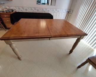 WINNERS ONLY INC - MADE IN MALASIA - SOLID WOOD DINING TABLE W/ SIX CHAIRS & 1 BUILT-IN PULL-OUT LEAVES - $200