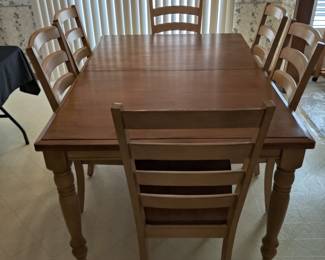 WINNERS ONLY INC - MADE IN MALASIA - SOLID WOOD DINING TABLE W/ SIX CHAIRS & 1 BUILT-IN PULL-OUT LEAVES - $200