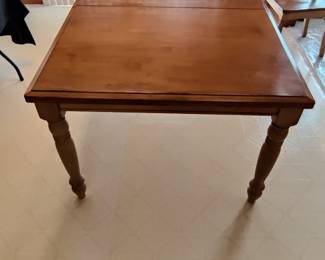 WINNERS ONLY INC - MADE IN MALASIA - SOLID WOOD DINING TABLE W/ SIX CHAIRS & 1 BUILT-IN PULL-OUT LEAVES - $200