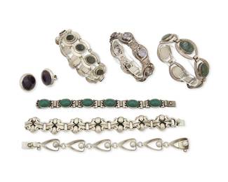 328
A Group Of Mexican Silver And Hardstone Jewelry
Mid/late 20th century; Taxco, Mexico
Five variously marked for maker, Sterling, and Mexico; further variously marked: Taxco / JVE / MR / TMP / SA / Cena [?]; one unmarked
Seven works comprising six link bracelets by various makers, most with set stones, including two Miguel Melendez bracelets, one with set obsidian, and one with set greenstone cabochons, as well as a Miguel Garcia Martinez/Rancho Alegre modernist link bracelet with silver ball accents, a Talleres Los Ballesteros chunky link bracelet with set cut purple stones, a narrow Cena bracelet with green cabochons, and an unmarked bracelet with chunky scroll and ball links, together with a pair of Melesio Rodriguez sterling silver and set amethyst round earrings, 8 pieces
Largest: 7.5" L x 0.875" H; Smallest: 6.5" L x 0.5" H; Each earring: 1" Dia.
320.0 grams gross
Estimate: $500 - $700