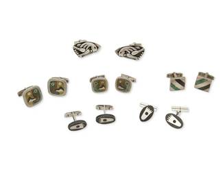 313
A Group Of Mexican Silver And Mixed Metal Cufflinks
Six works:

Salvador Teran (c. 1920-1974)
Circa 1955-1970; Mexico City, Mexico
Stamped: Salvador / Sterling / Mexico / [Eagle 36] / 140
A pair of sterling silver overlay cufflinks with masked figural motif, 2 pieces
Each: 1.375" H x 0.875" W

A group of Los Castillo silver and inlay cufflinks
Circa 1950-1965; Taxco, Mexico
Each stamped: Los Castillo; further variously stamped: Taxco / Sterling / Made in Mexico / [Eagle 15] / Hecho en Mexico / Metales Castillo / 61 / 893 / 63 / Onix Negro
Five pairs of cufflinks in sterling silver and stone or mixed metal inlay in various figural and abstract motifs, 10 pieces
Largest: each: 0.875" H; Smallest: each: 0.625" H

12 pieces total
94.5 grams gross
Estimate: $200 - $400