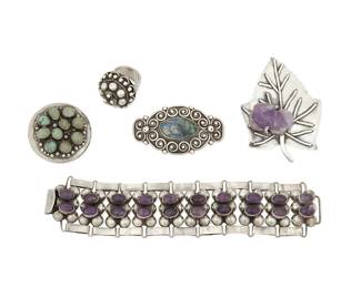 271
A Group Of Carmen Beckmann Silver And Hardstone Jewelry
Carmen Beckmann (b. 20th century)
Circa 1960-1980; San Miguel de Allende, Mexico
Each stamped: Beckmann [or Bekmann] / Sterling / Mexico
Five works in sterling silver comprising a silver and set amethyst "caviar" link bracelet (6.5" L x 1.375" H), two stone-set brooches, including a round brooch/pendant (Larger: 2.25" H x 1.25" W; Smaller: 1.625" Dia.), as well as a silver leaf brooch with set carved amethyst frog (2.75" H x 2" W), and a silver domed ring with silver ball cluster detail (Ring size: 4.5; 1" Dia.), 5 pieces
130.3 grams gross
Estimate: $800 - $1,200