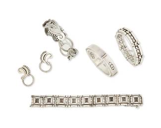 326
A Group Of Mexican Silver Jewelry
Five works:

Hector Aguilar (1905-1986)
Circa 1940-1945, 1948-1962; Taxco, Mexico
Each stamped: HA [conjoined] / Taxco; further variously stamped: 940 / 990 / .940 / Mexico / / [Eagle 9] / Taller Borda
Three sterling silver link bracelets in various styles and sizes, two with silver ball accents and one with elaborately incised square links, 3 pieces
Largest: 7.25" L x 0.875 "H; Smallest: 7" L x 0.5" H

Carmen Beckmann (b. 20th century)
Mid-20th century; San Miguel de Allende
Bracelet stamped: Beckmann / Sterling / Mexico; earrings unmarked
Two works comprising a foliate scroll-and-ball motif link bracelet (7.5" L x 0.875" H) with a pair of similar design earrings (Each: 1.5" H), 3 pieces

6 pieces total
242.9 grams
Estimate: $800 - $1,200
