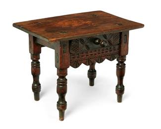 155
18th/19th century
A Spanish Colonial Carved Wood Stool
The wood stool with mortise and tenon joints and single felt-lined drawer and apron, each with carved wood designs, set on four turned wood legs
16.25" H x 21.25" W x 15" D
Estimate: $400 - $600