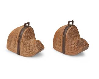 207
19th century; Chile/Argentina
A Pair Of South American Carved Wood Stirrups
After Spanish Colonial design, the wood stirrups with blunt tips, various carved motifs, and cast iron oxbow straps, 2 pieces
Each: 7.5" H x 5.5" W x 7.75" D approximately
Estimate: $500 - $700