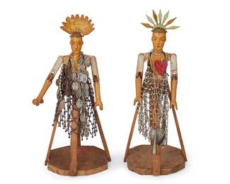 177
20th century
Two Paraguayan Santos Cage Dolls
The tabletop carved wood mannequins, each with articulated wood arms, one adorned with silver saint medals, one with painted red heart and adorned with a multi-strand necklace and various silver religious pendants, 2 pieces
Larger: 17.25" H x 7" W x 7" D; Smaller: 16.75" H x 7" W x 7" D
Estimate: $500 - $700