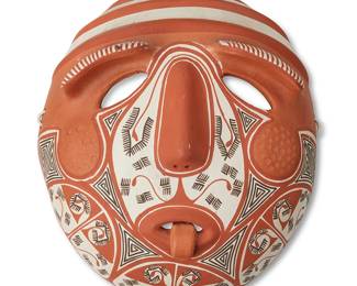 133
21st century
A Venezuelan Polychrome Pottery Mask
Incised to mask interior: Ceramic / Quibor / Lara / Venezuela
The terracotta mask with pronounced eyebrows and protruding tongue, decorated with black geometric motifs on a white and terracotta slip
6.625" H x 6" W x 2.325" D
Estimate: $200 - $400