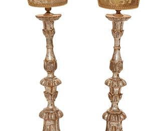 150
18th/19th century
A Pair Of Pricket Stick Lamps
Each carved silvered and giltwood pricket stick on three-footed base later converted to a single-light lamp with custom single-sided embroidered velour sconce shade with gimp trim and braided cording, electrified, 2 pieces
Each: 40" H x 11" W x 10" D
Estimate: $1,000 - $2,000