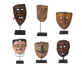 194
19th/early 20th century; Oaxaca, Mexico
A Group Of Mexican Carved Wood Masks
Each unmarked
Comprising six carved wood masks, four with polychrome and one with applied leather and horse hair, each set on custom metal display stands, 6 pieces
Largest: 9.5" H x 6.125" W x 4.5" D; Smallest: 7.5" H x 5.25" W x 3.625" D
Estimate: $500 - $700
