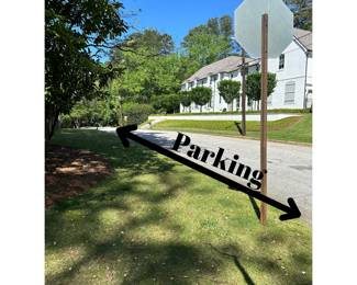 please park on Carmain Dr NE and use the grass/pine walkway to the house