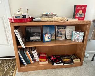 Wood bookcase and books