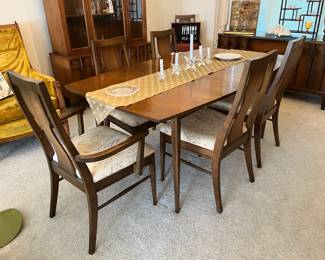 MCM dining table (shown with one leaf) with 3 leaves total and 7 chairs.....
