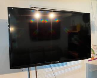 Samsung 46" flatscreen TV with wall mount and stand.....