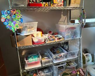 Metal shelving unit and craft supplies