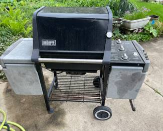 Weber gas grill with cover.....