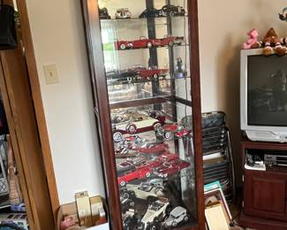 Curio cabinet with sliding door