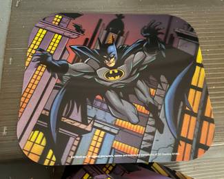 A stack of lenticular Batman mousepads!