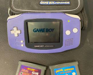 Game Boy Advance with 2 game cartridges and case