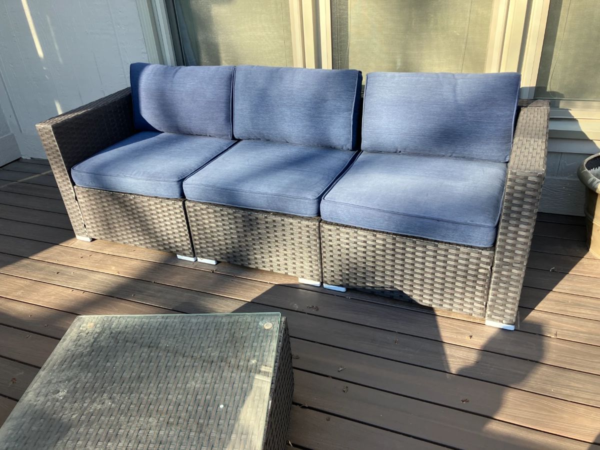 Patio sofa w blue cushions