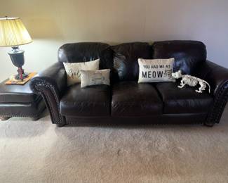 Leather Sofa Needs A Little Scratch Cover Up.  Good Bones and Sits Well.