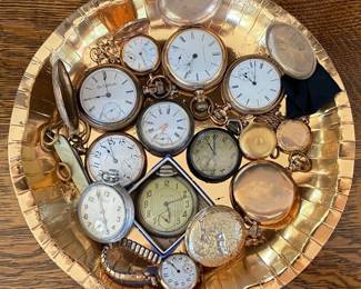 collection of old pocket watches