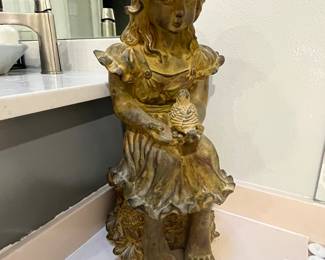 Girl and her bird sculpture figurine 