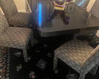 Italian style black lacquer dining room table and upholstered chairs 