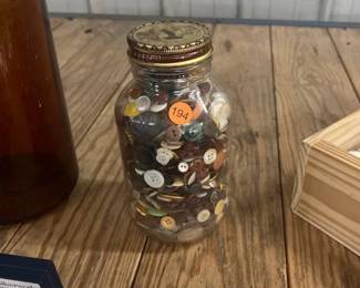 GLASS JAR OF VARIOUS BUTTONS