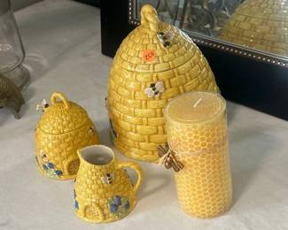 TWO BEE HIVE CANISTERS , CANDLE , AND SMALL PITCHER