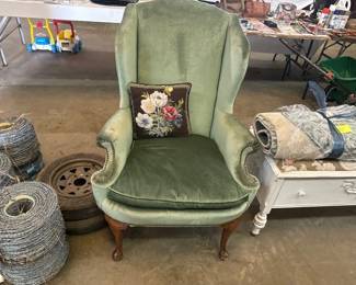 GREEN UPHOLSTERED CHAIR