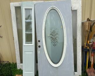 EXTERIOR DOOR WITH SIDE LIGHT PANELS AND TWO GLASS DOORS